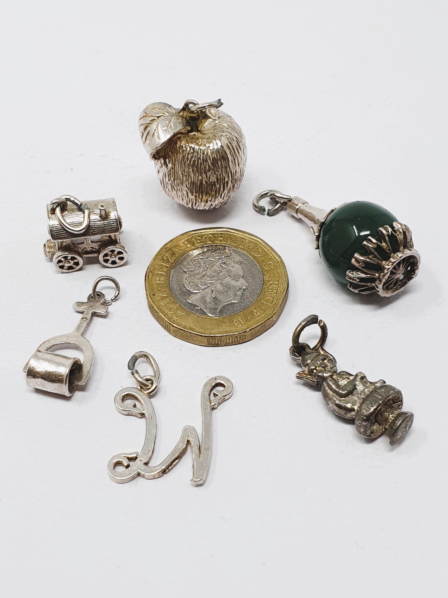 Sterling silver selection of fifteen vintage charms, including Scottish thistle, ship in bottle,