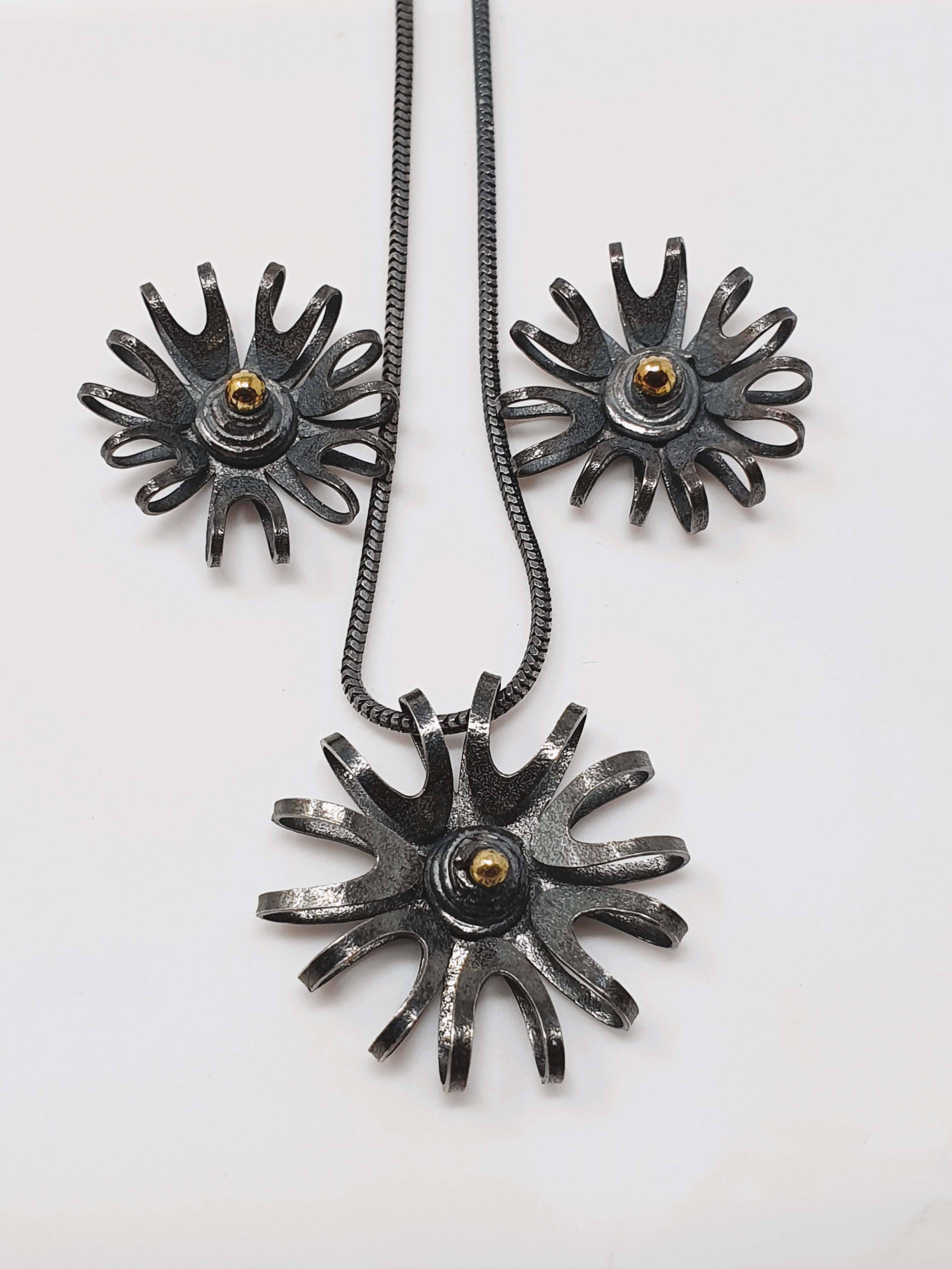 Sian Elizabeth Hughes, handmade sterling silver 'Foliage' necklace and two 'Bloom' pendants,