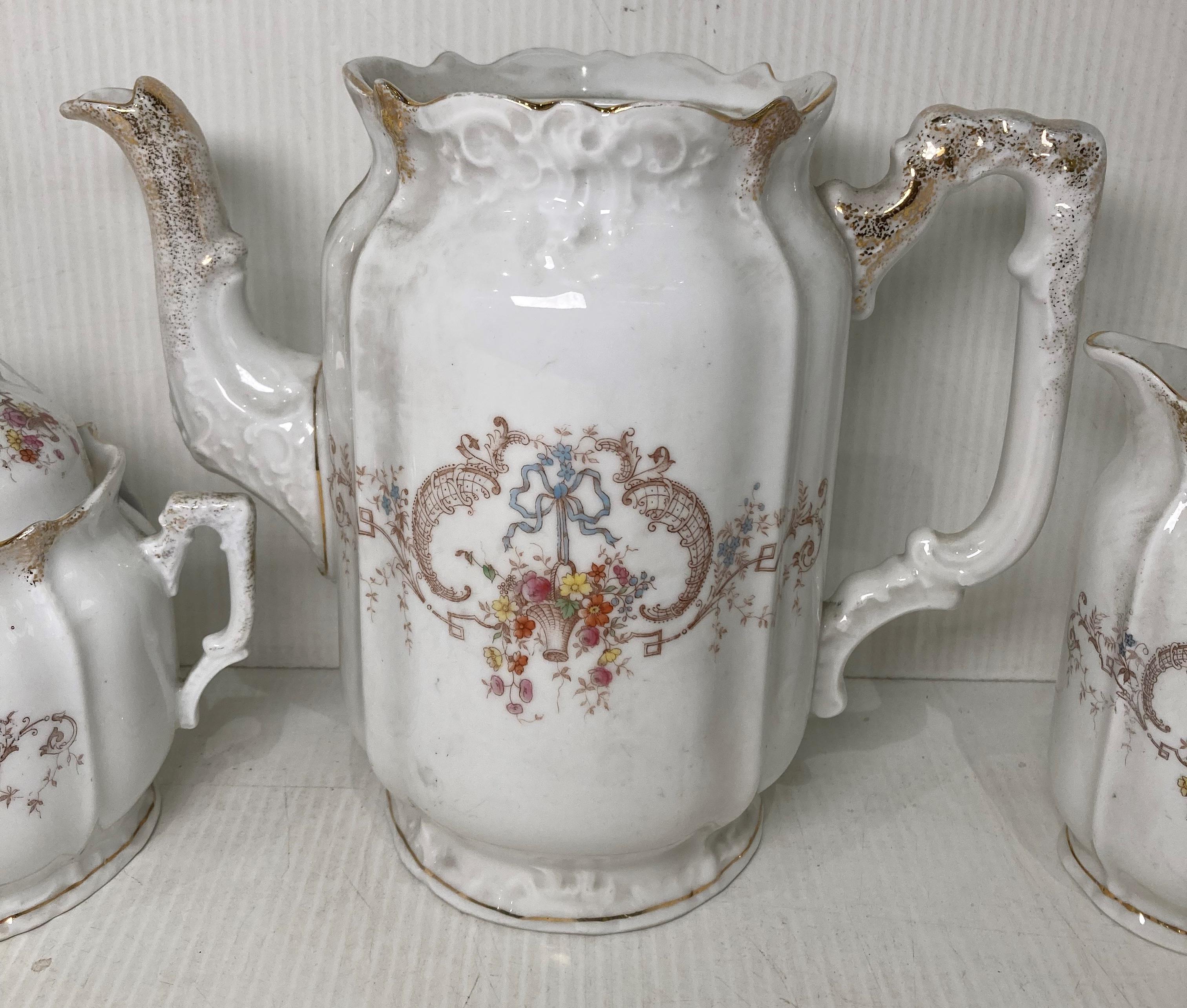 A late 19th Century Hermann Ohme three-piece tea service including sugar bowl (with lid), milk jug, - Image 3 of 5