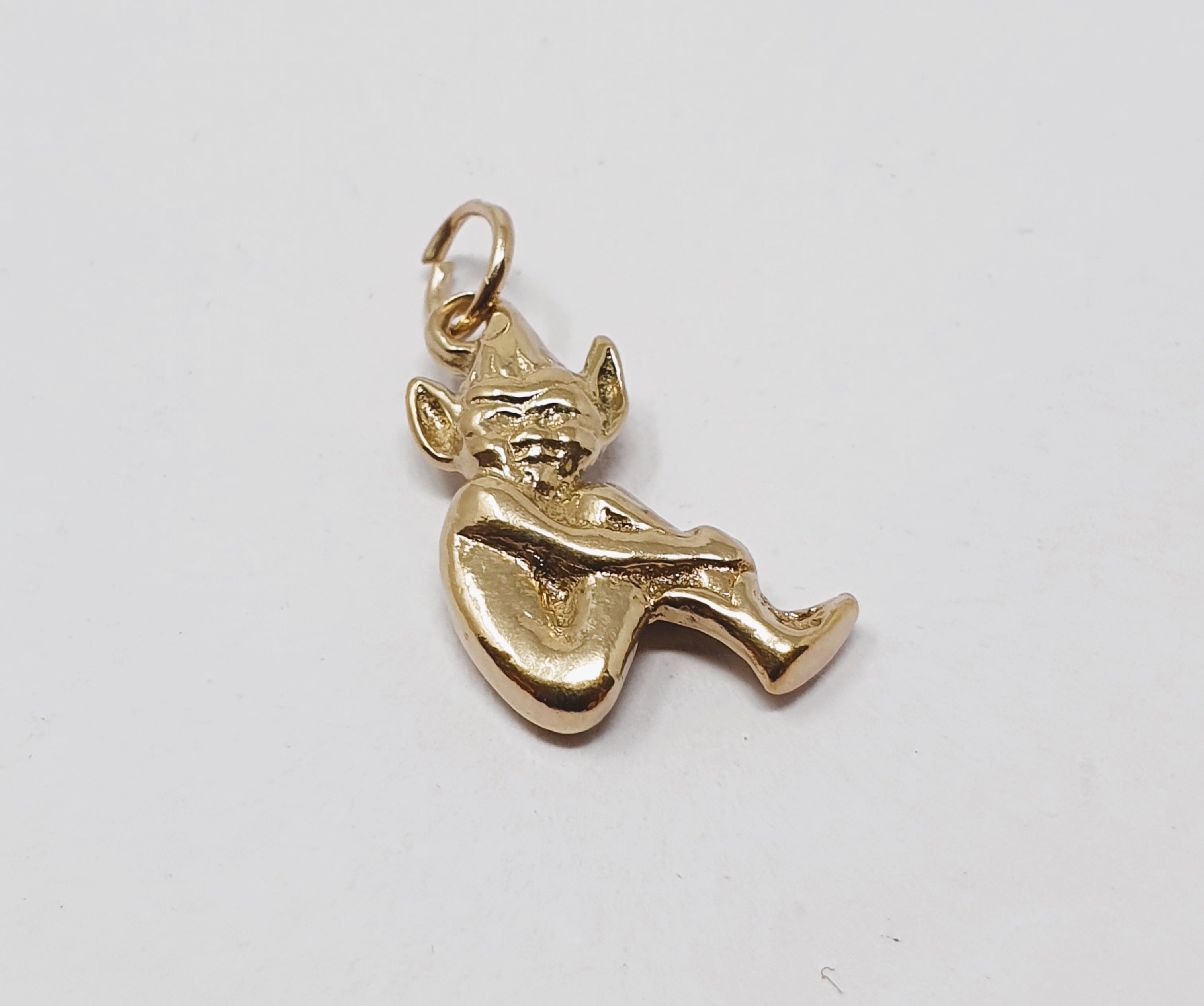 9ct gold vintage pixie charm, gross weight 3.