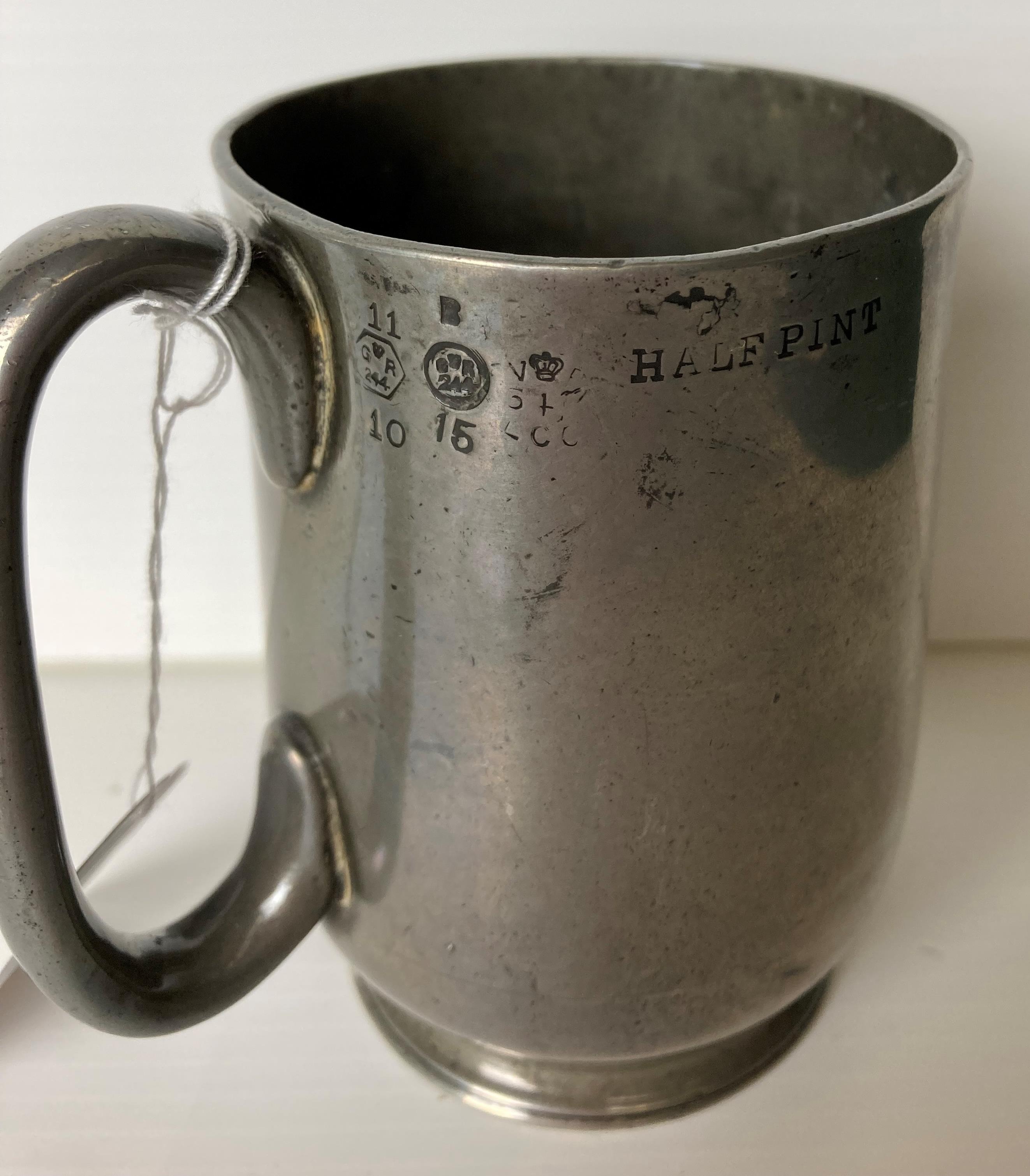 A pewter half-pint tankard with four Royal Sphere markings and etched with 4 N Dodds and stamp to - Image 2 of 4