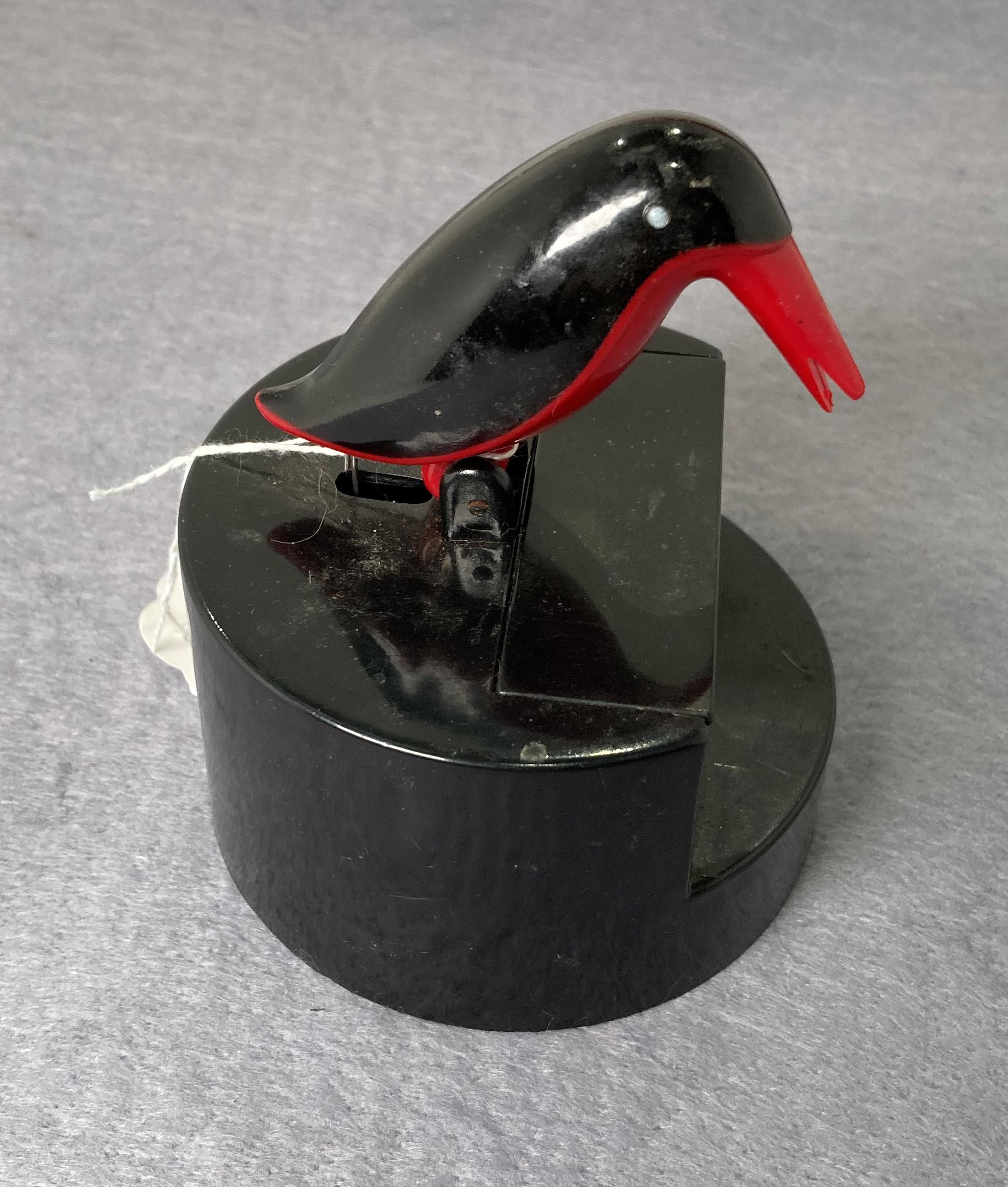 Retro black and red plastic novelty bird cocktail stick holder (saleroom location: S3 QC07)