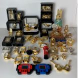 Forty assorted miniature gold tone clocks by Parklane, Empress, etc - including Kingfisher, Eagle,