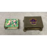 A vintage enamelled matchbox holder and a Tudric pewter matchbox holder with 'The Poultry Club,