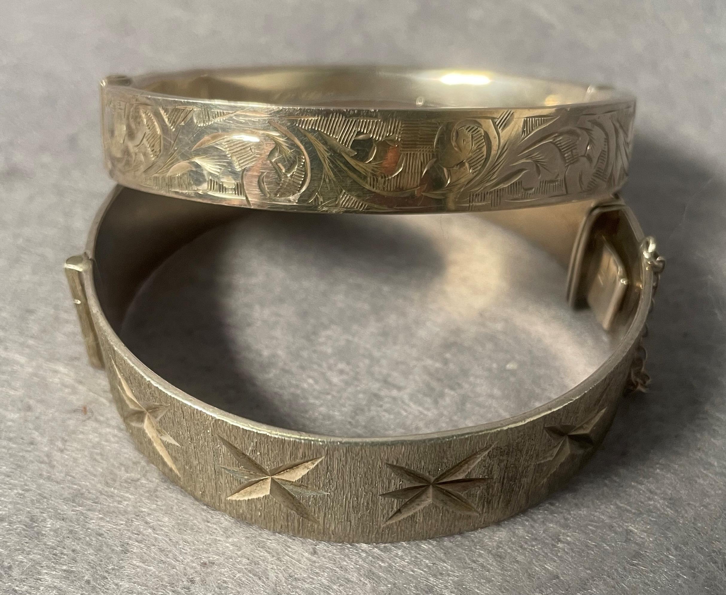 Two assorted silver hallmarked bangles including Birmingham 1968 etched floral design and a Chester