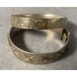 Two assorted silver hallmarked bangles including Birmingham 1968 etched floral design and a Chester