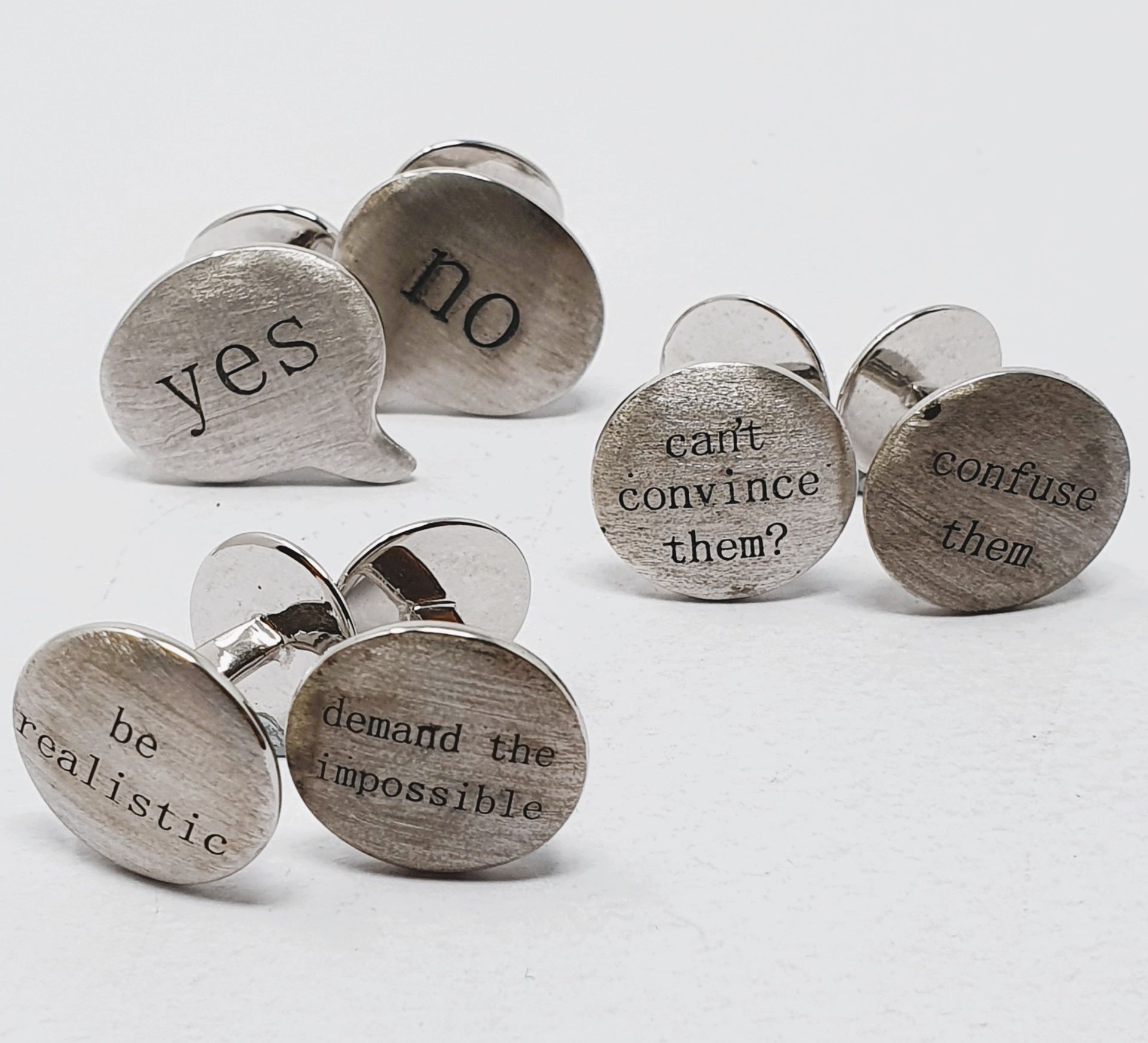 Sterling silver cufflinks, three pairs - 'can't convince them/confuse them',