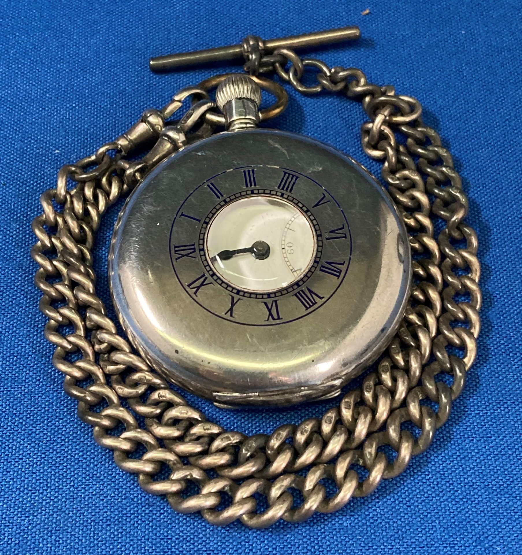 A silver (hallmarked) pocket watch by JWB London 1939 and a vintage silver (hallmarked) fob T-bar