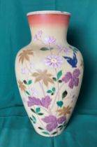 A 20th Century hand-painted glass vase with floral design,
