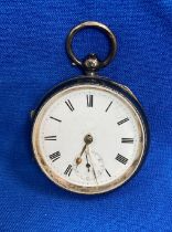Silver (1903, Chester) pocket watch with white face and Roman numerals. Total weight: 4.