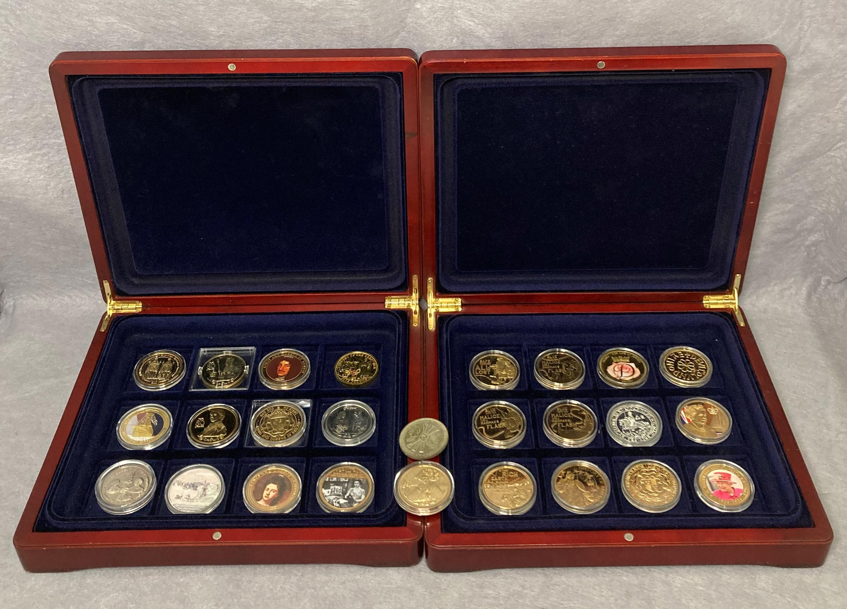 Contents to two fitted coin cases - twenty-six assorted commemorative coins some in silver and gold