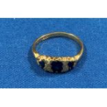 18ct gold, diamond and sapphire ring with three sapphires and four small diamonds (size O).