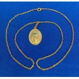 18ct gold Miraculous Medal and chain (20" long). Weight: 11.
