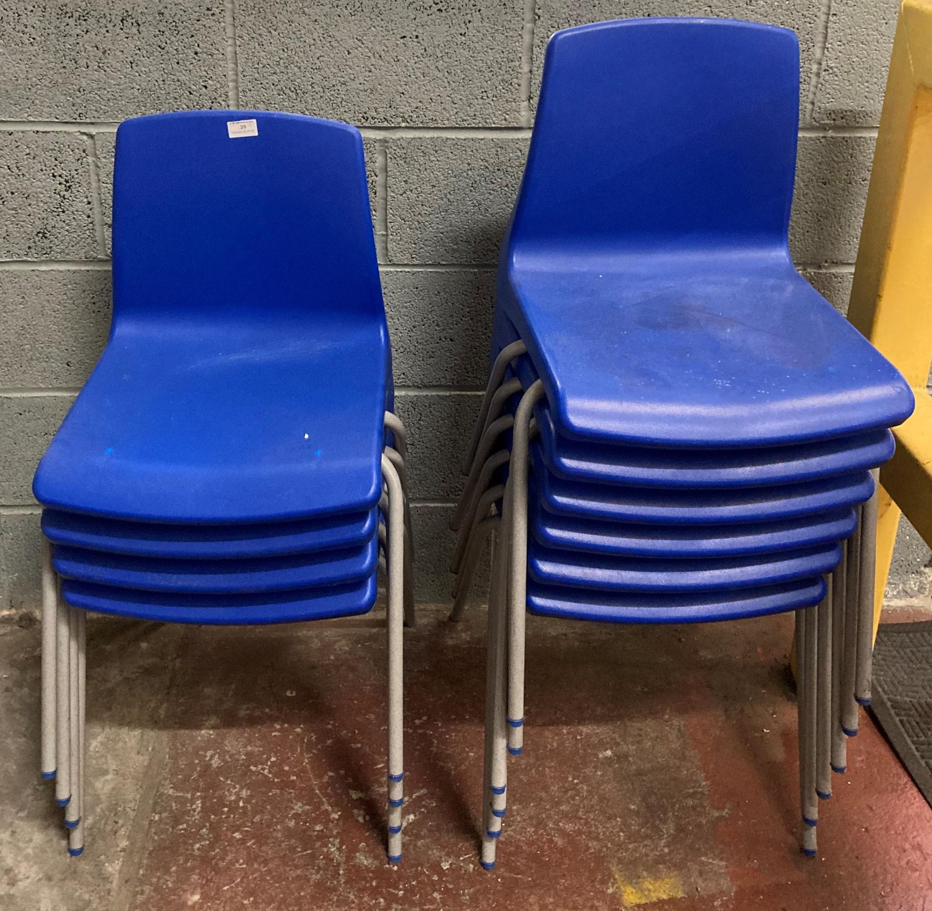 Ten blue plastic stacking chairs (collection address: Unit 6A, Church Street, Mexborough,
