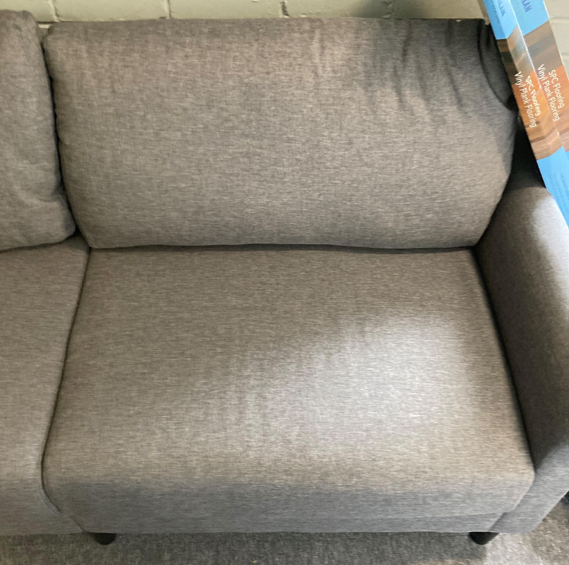 Modern grey fabric upholstered three seater settee on black legs, - Image 2 of 2