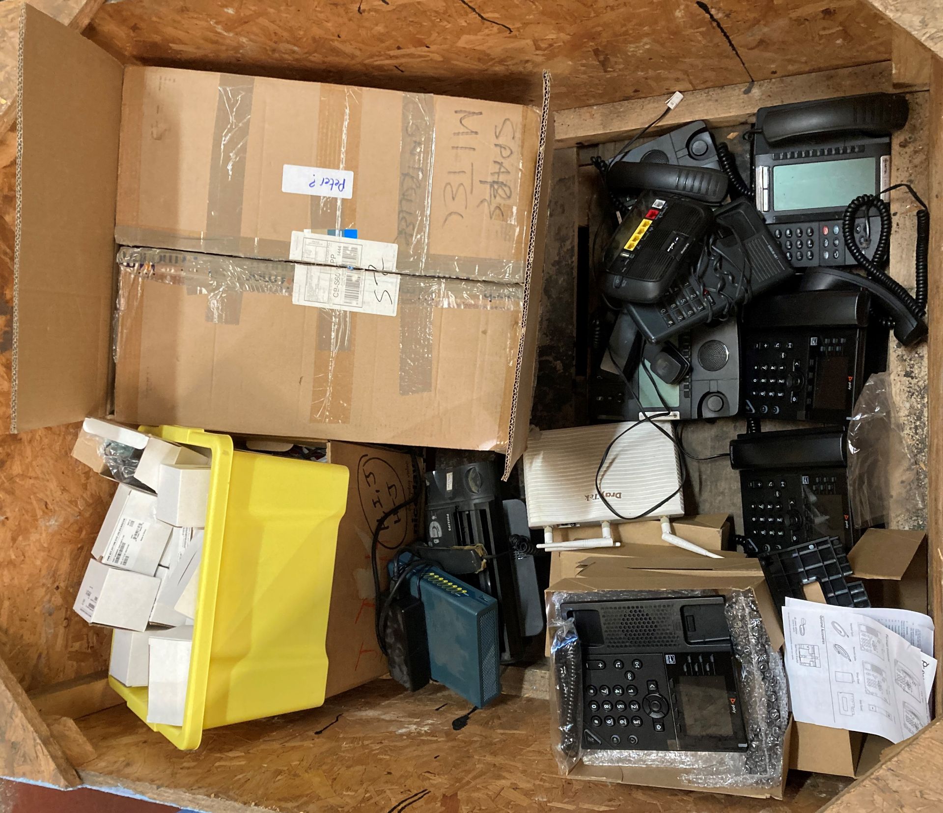 Contents to crate - assorted phone handsets including eight Poly VVX350 Business IP Phones,