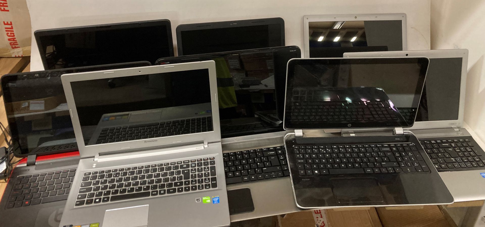 8 x assorted laptops (no batteries or power leads - one screen cracked - all possibly faulty and