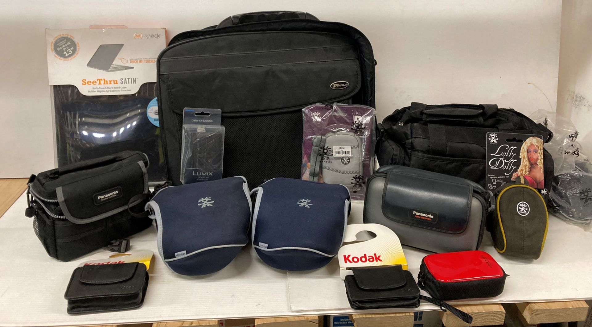 Contents to crate - quantity of camera bags and laptop cases (saleroom location: J10 FLOOR)