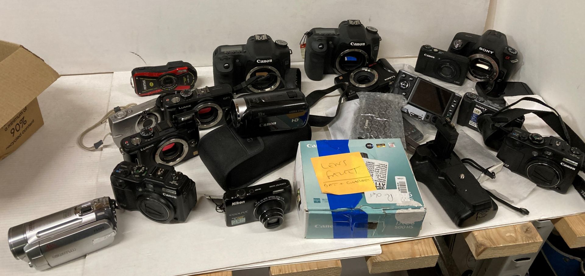 Contents to box - assorted cameras by Canon, Panasonic, Pentax, Nikon,