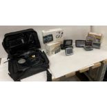 9 x TomTom and Navman sat navs complete with chargers and a Portable in-car DVD Player (saleroom