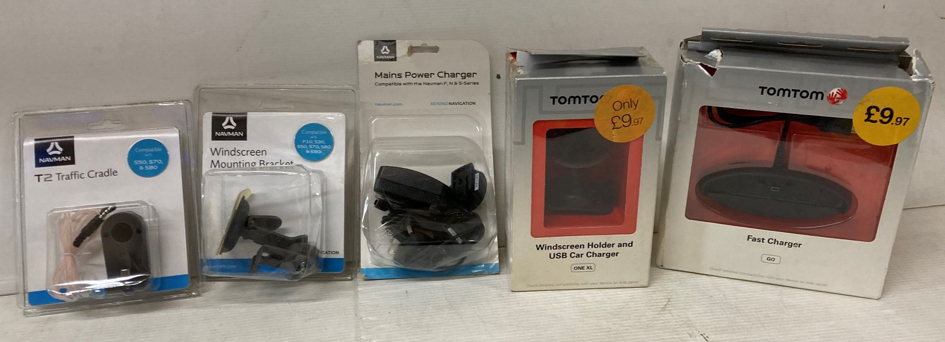 35 x assorted Navman and TomTom fast chargers, windscreen mounts, mains power chargers,