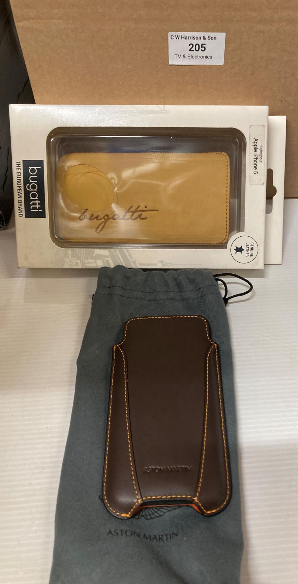 23 x assorted Aston Martin and Bugatti leather phone pouches for iPhone 5 and iPods (saleroom