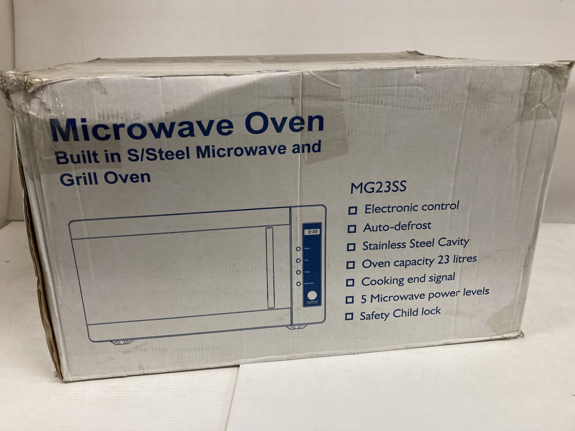 A built-in stainless steel microwave oven and grill MG23SS (boxed) (saleroom location: L12)
