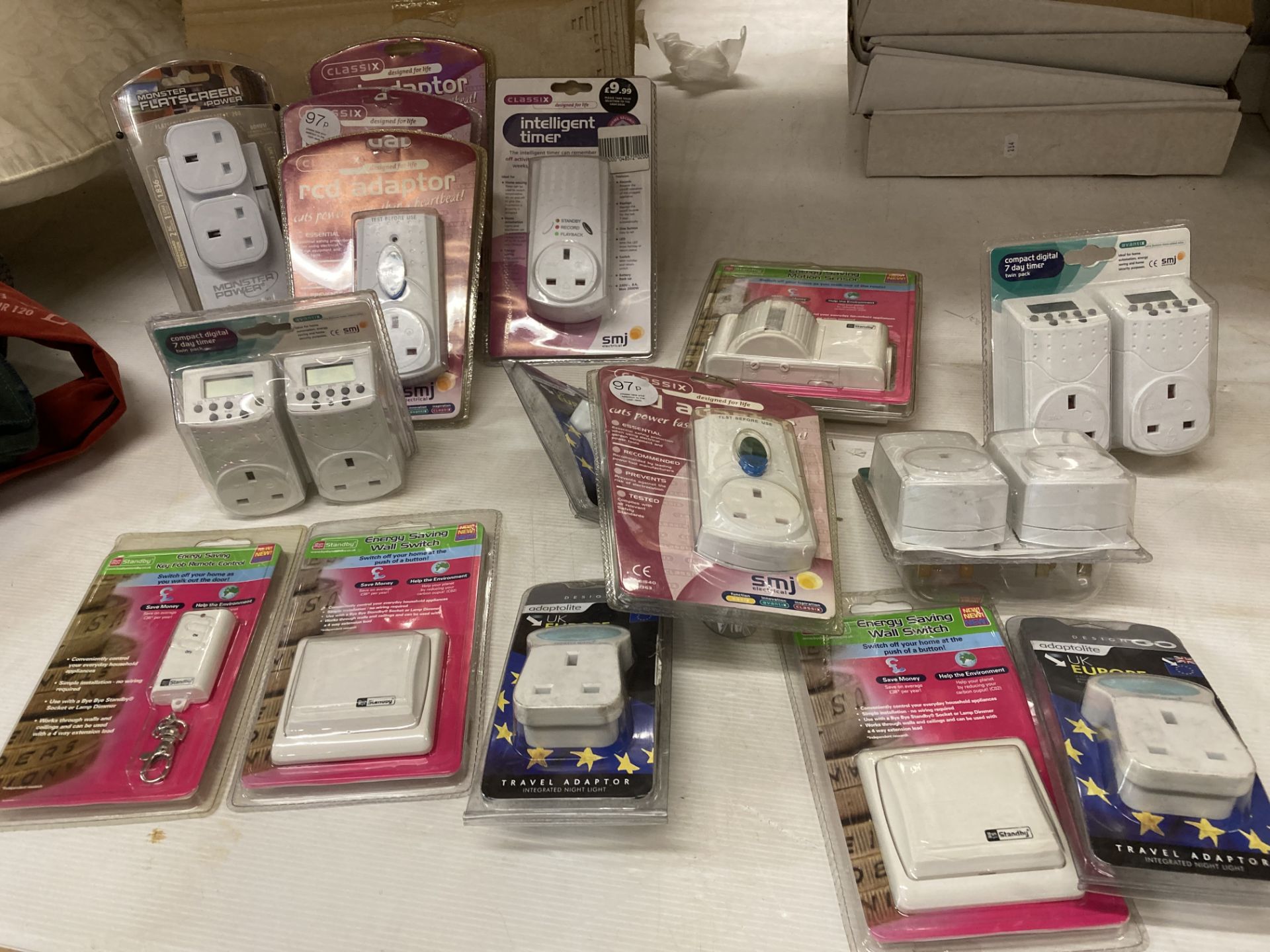 16 x assorted plug wall timers, wall switches, motion sensors,