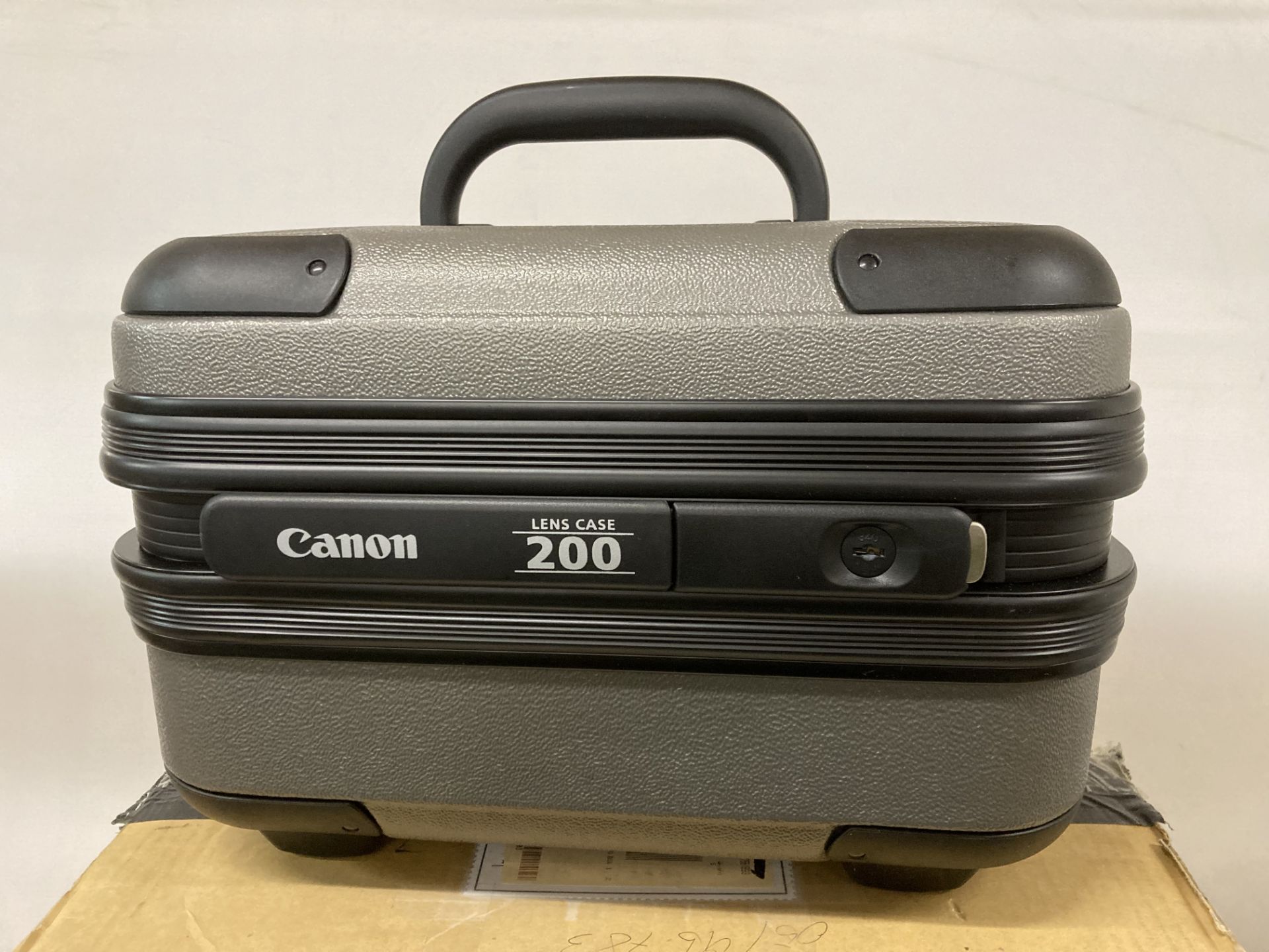 Canon 200 Lens case (saleroom location: J112) Further Information DISCLAIMER - THE