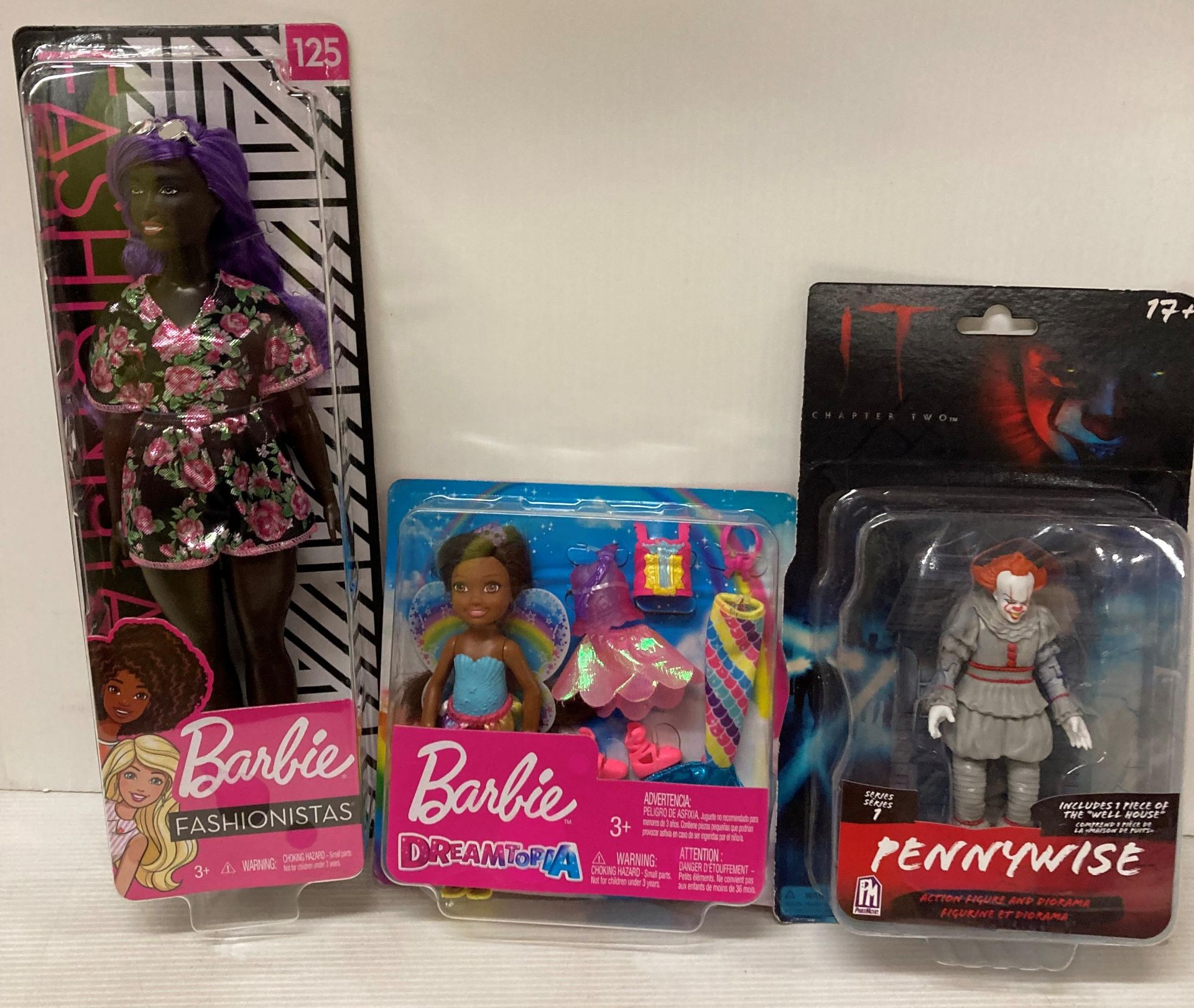 10 x assorted Pennywise and Barbie figures including 4 x Barbie Fashionista Dolls (saleroom