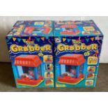 24 x The Grabber toy games (4 x outer boxes) (saleroom location: MA2) Further Information