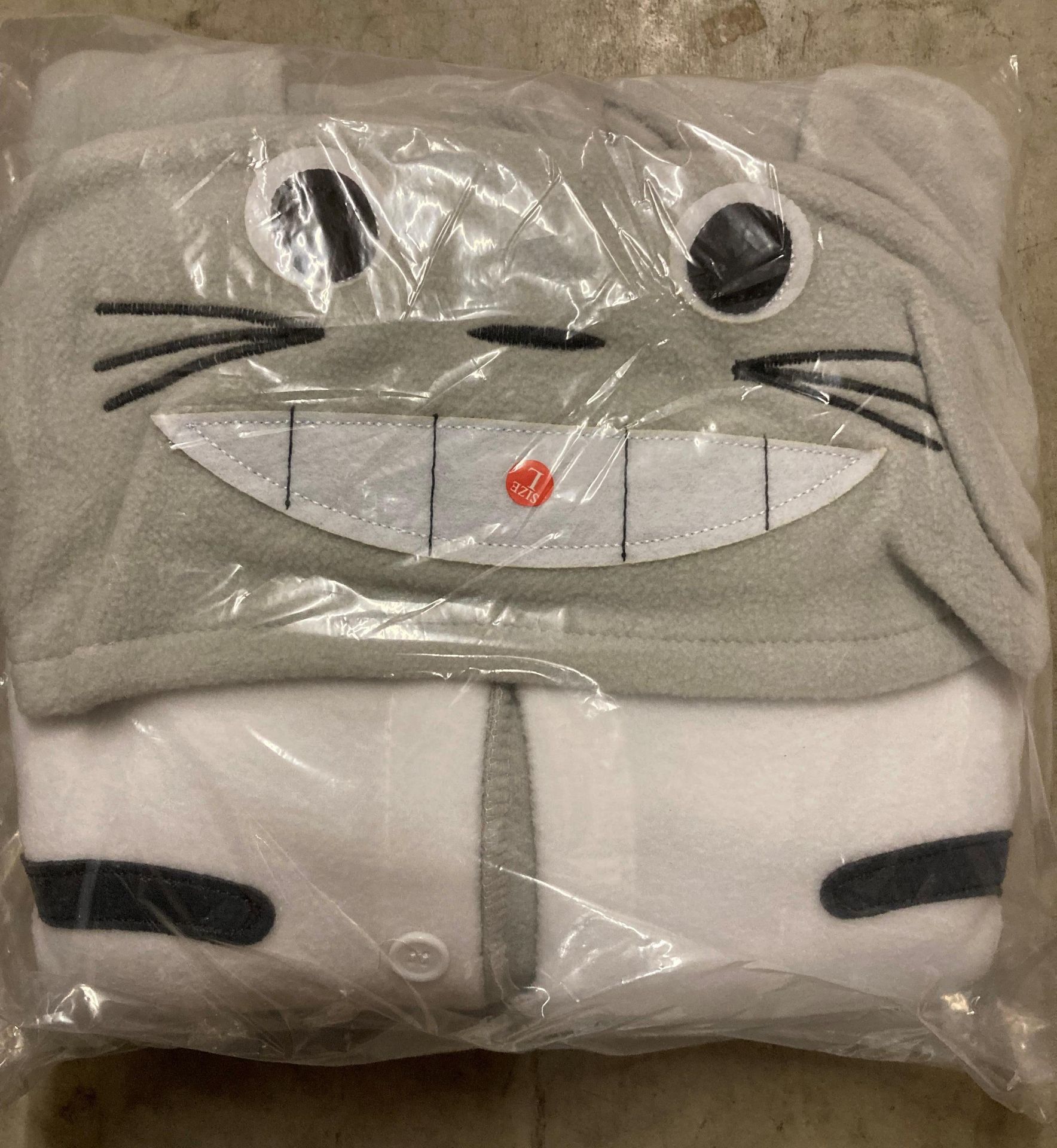 Contents to box - 13 x Totoro Wanziee onesies in various sizes (saleroom location: K06 floor)