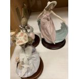 Three Lladro figurines - 'Girl with Dove' (18cm high),