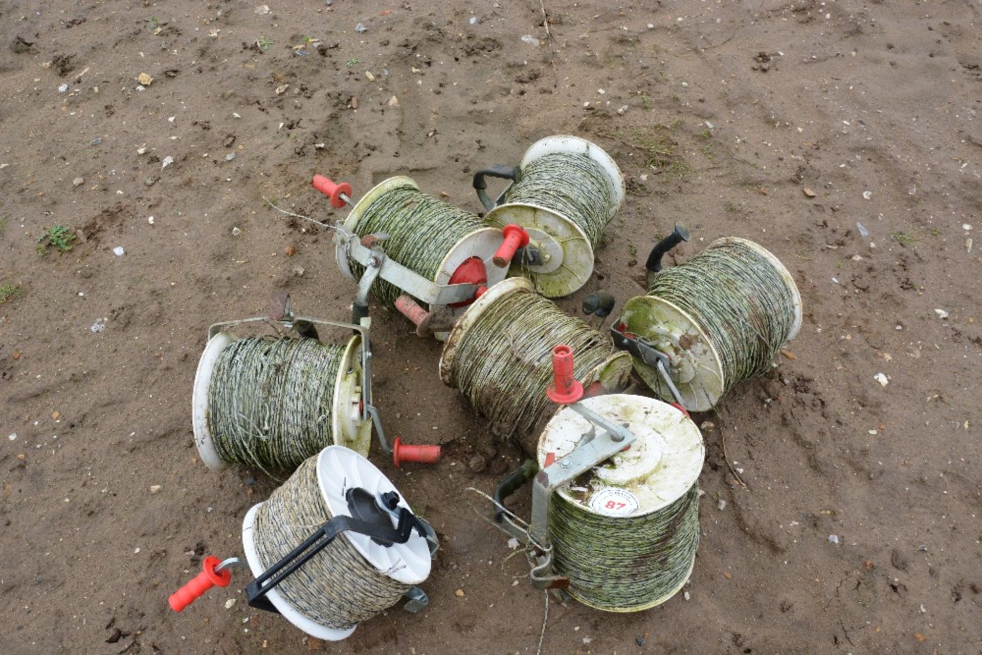 Rolls of electric fence wire as lotted