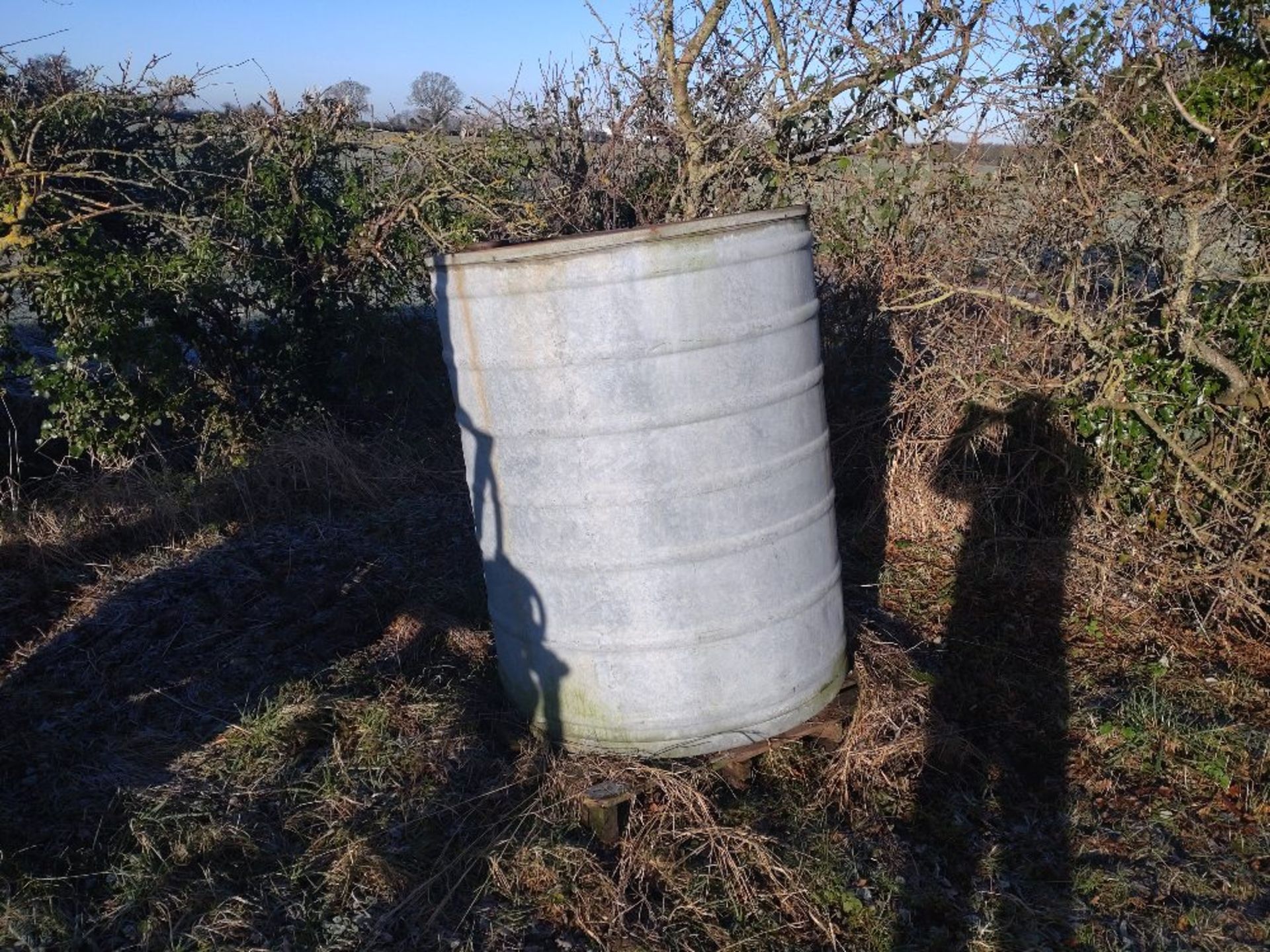 Galvanised tank with tap