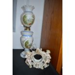 Electrified Hand Painted Glass Oil Lamp, and a Continental Porcelain Clock Surround