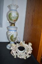 Electrified Hand Painted Glass Oil Lamp, and a Continental Porcelain Clock Surround
