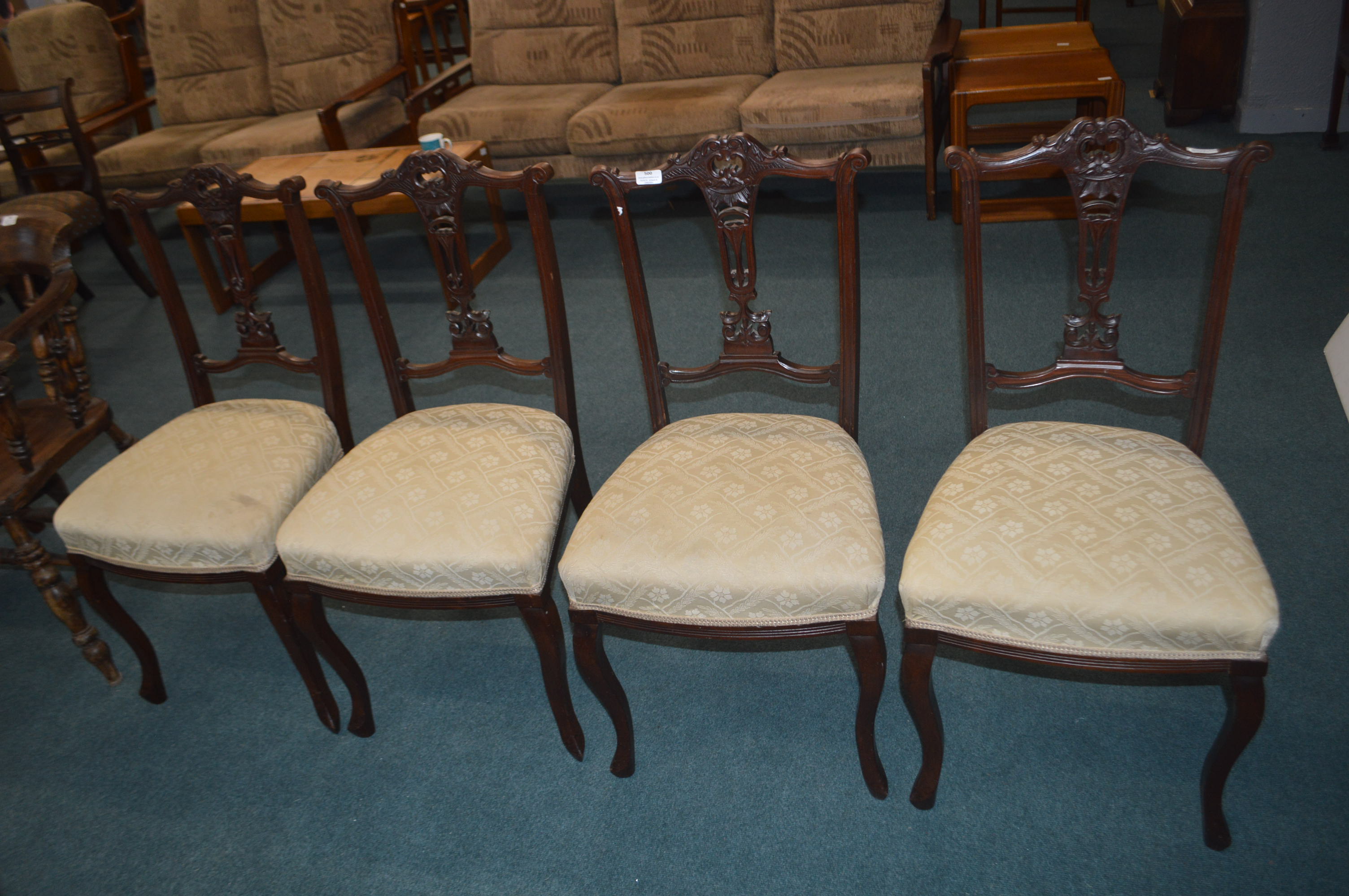 Set of Four Carved Mahogany Dining Chairs