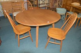 Oval Teak Drop Leaf Dining Table with Three Spindl
