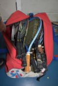 Bag of Assorted Bats and Rackets