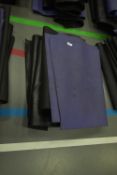 Four Black and One Purple Yoga Mats