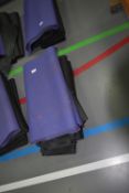 Four Black and Two Purple Yoga Mats