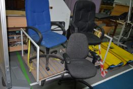 Three Office Chairs and Two Trolleys