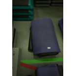 Four Black and One Purple Yoga Mats