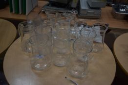 Twelve Glass and Two Plastic Jugs