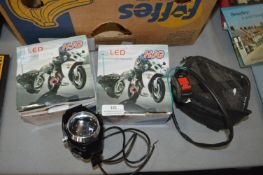 Two HJG LED Projector Lenses and a Satnav Bag