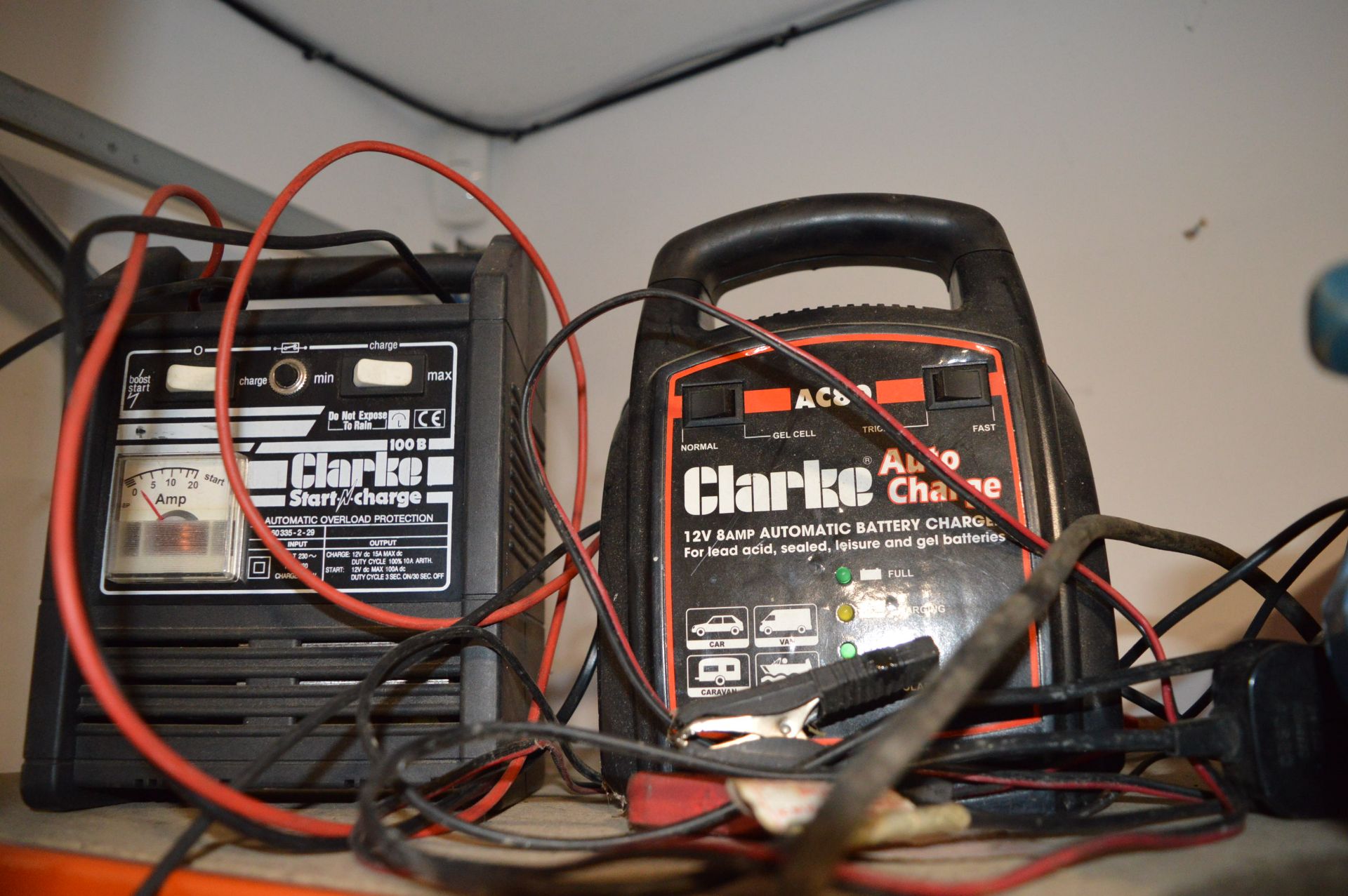 Two Clark Battery Chargers, and a 3-in-1 Light/Pressure Gauge