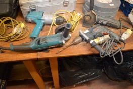 Four 110v Tools Including Bosch Angle Grinder, Dill, Makita Angle Grinder, and Drill