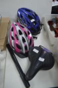 Two Bicycle Helmets, plus a Saddle, and a Pump