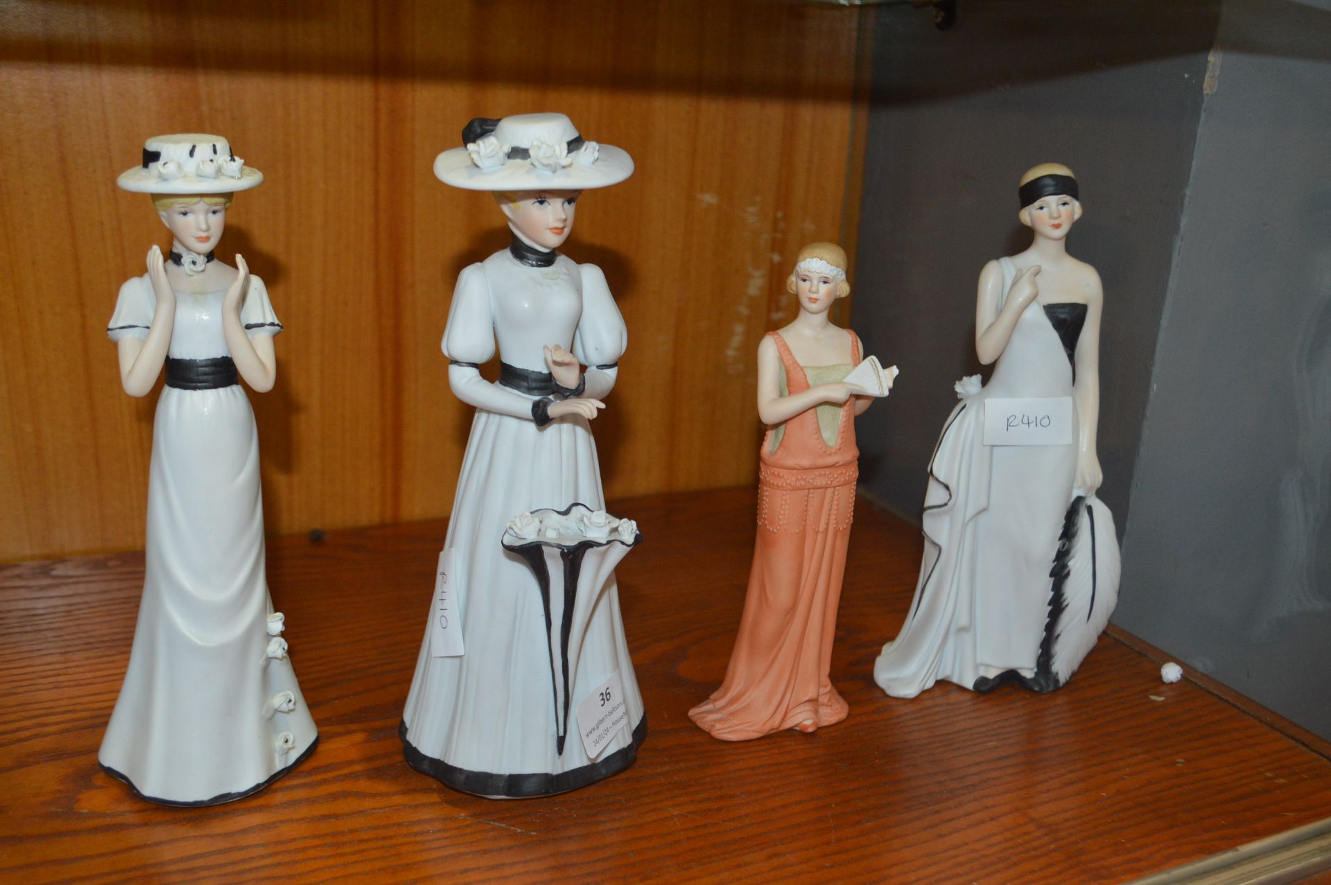 Four Decorative Figurines